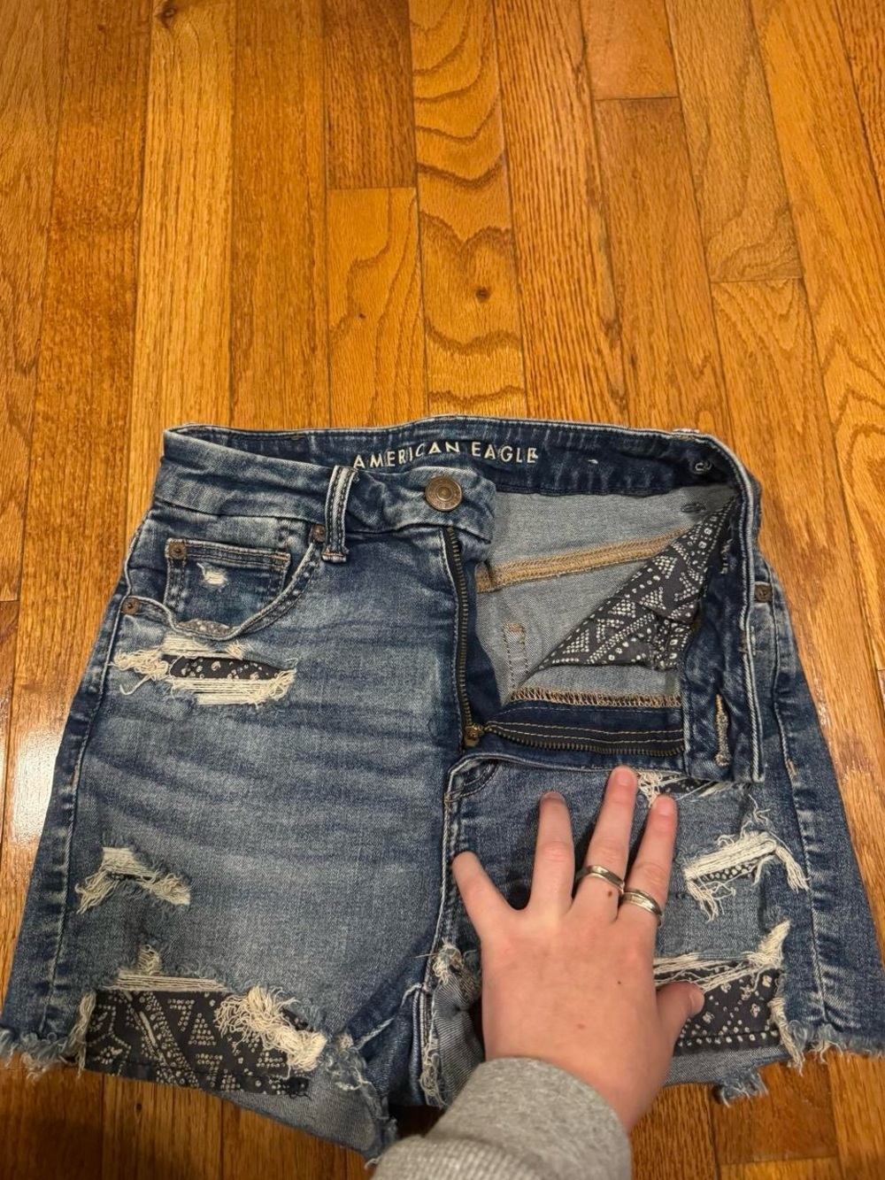 American Eagle Outfitters blue denim distressed shorts